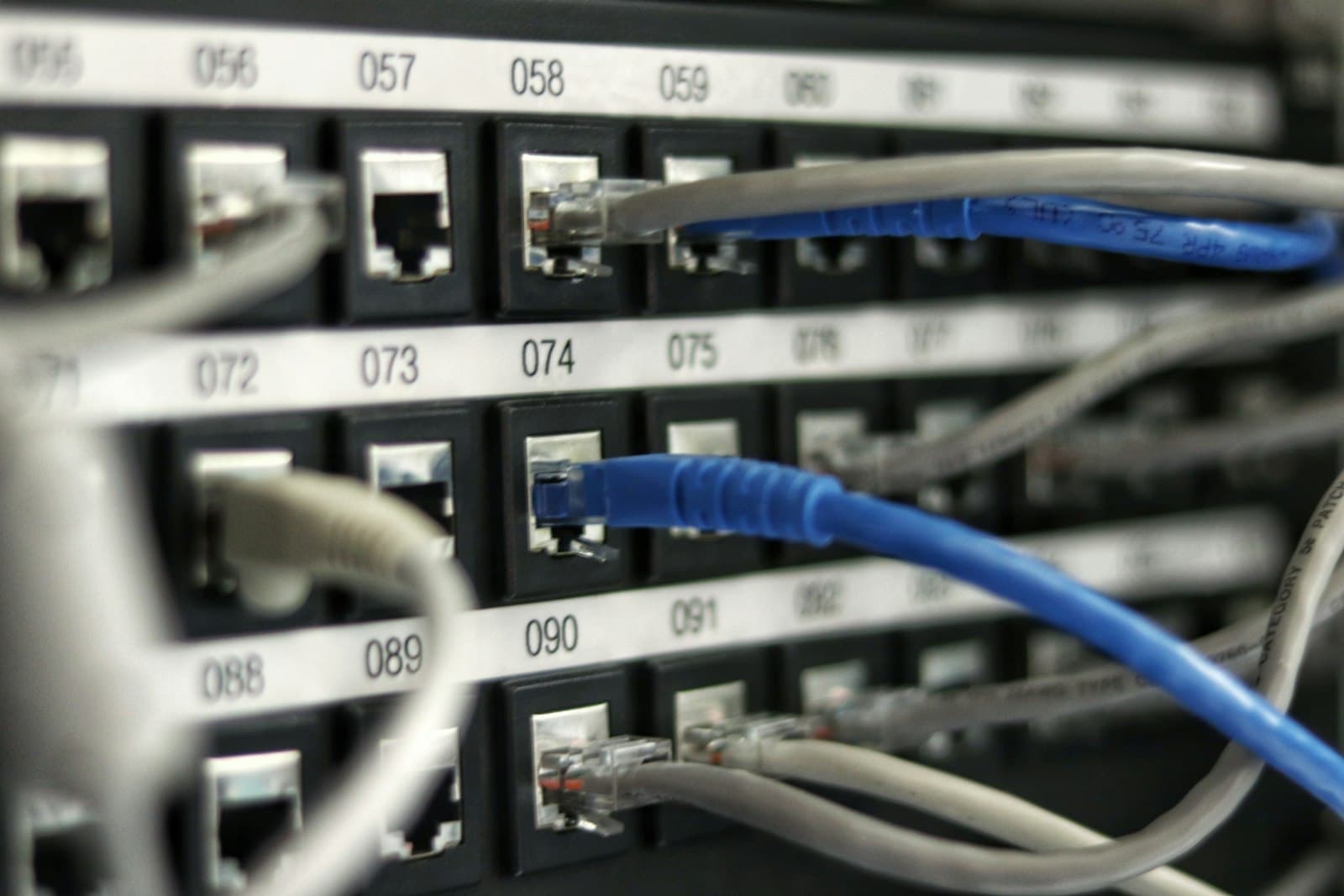 Network patch panel with organized ethernet cabling