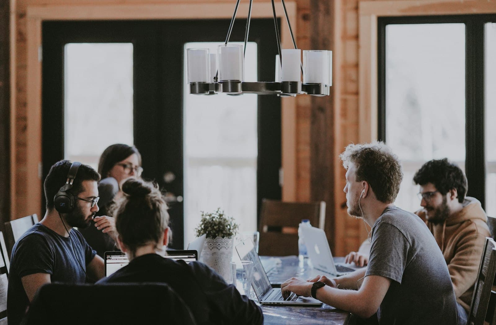 Team members working together around a shared table